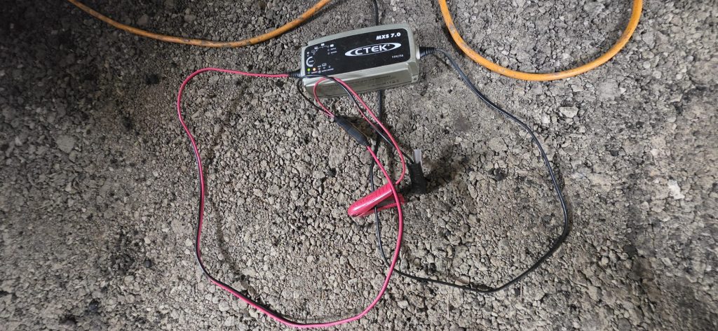 CTEK smart battery conditioner used to keep stored cars' batteries charged